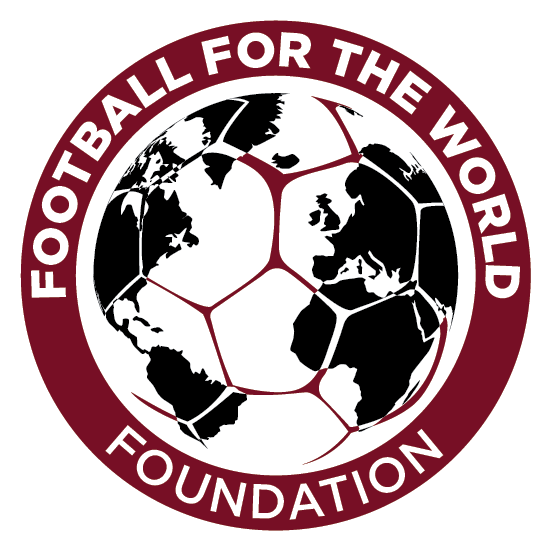 Globe with soccer ball overlay. Maroon border with text: Football for the World Foundation