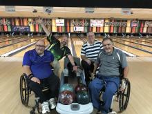 a wheelchair bowling team